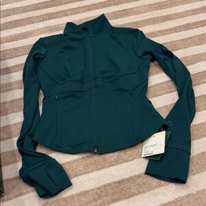 Halara UltraSculpt™ Mock Neck Push-Up Long Sleeve Thumb Hole Yoga Jacket.